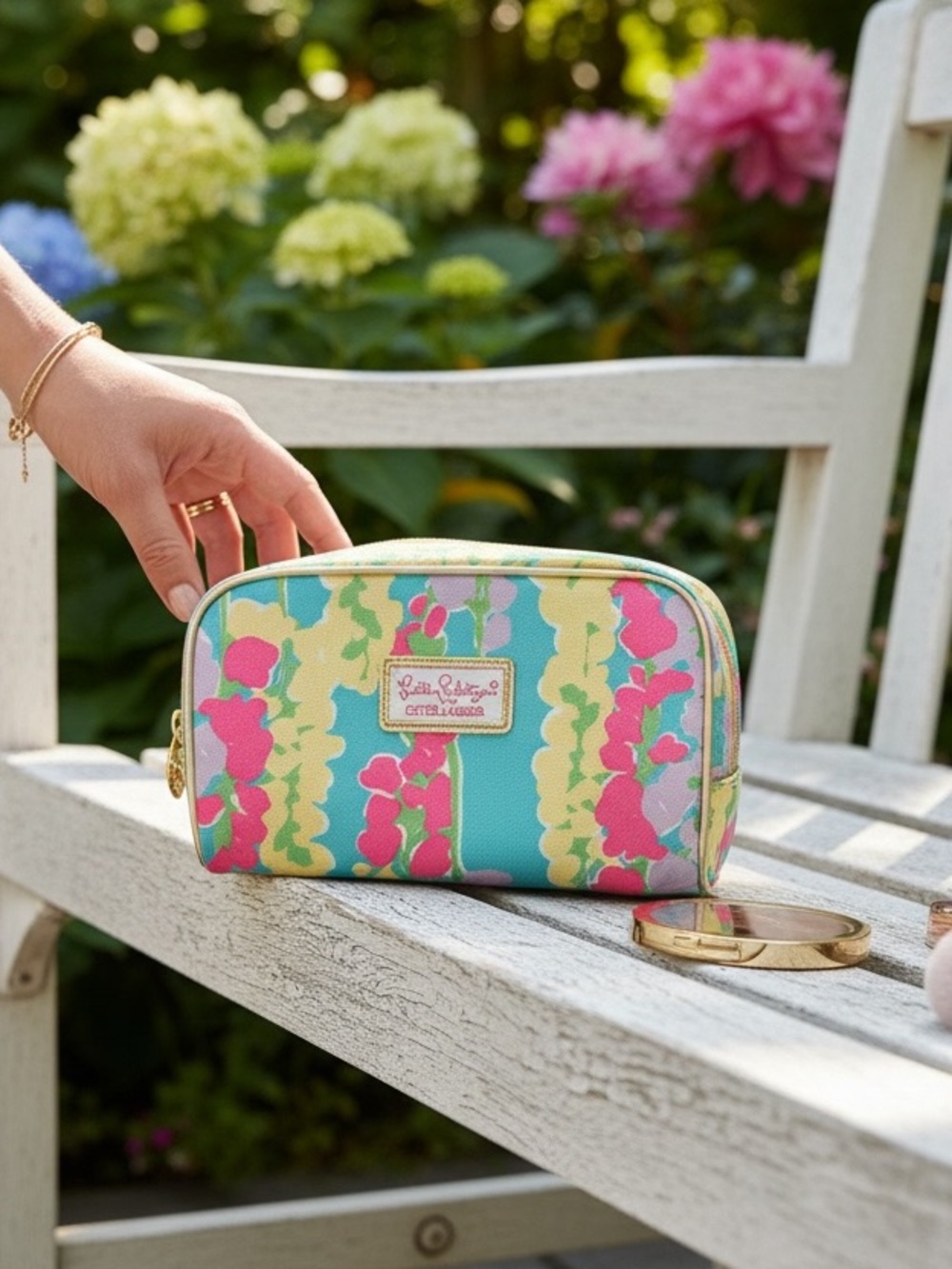 Lilly Pulitzer for Estée Lauder bright flowers cosmetic bags